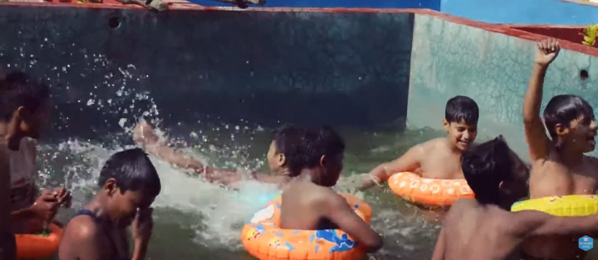 Spacious hostel room with beds and desks